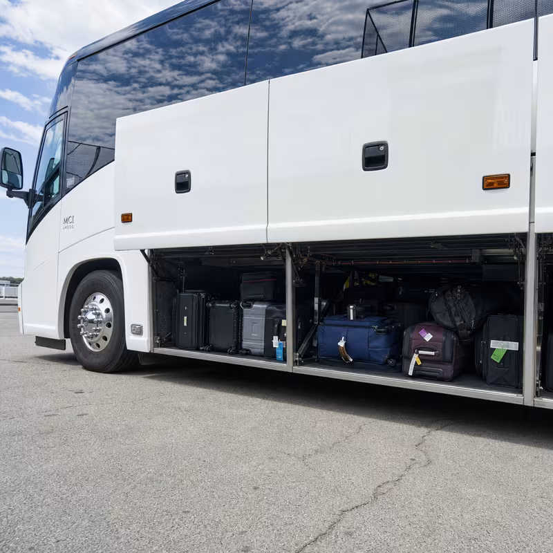 Party bus interior with wraparound leather seating and LED lighting in Washington