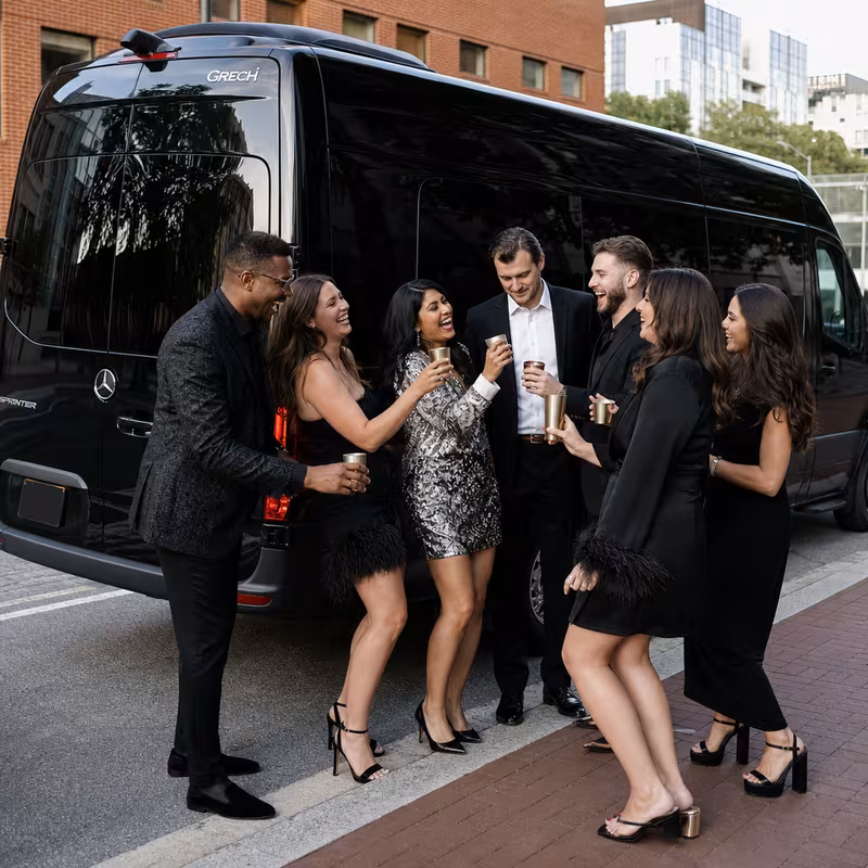 Group boarding a white charter bus for Bachelor & Bachelorette Transportation transportation in Washington