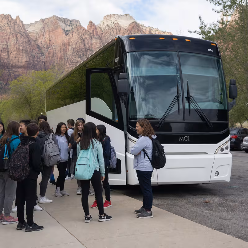 Black Mercedes Sprinter van staged for an Washington School Transportation group
