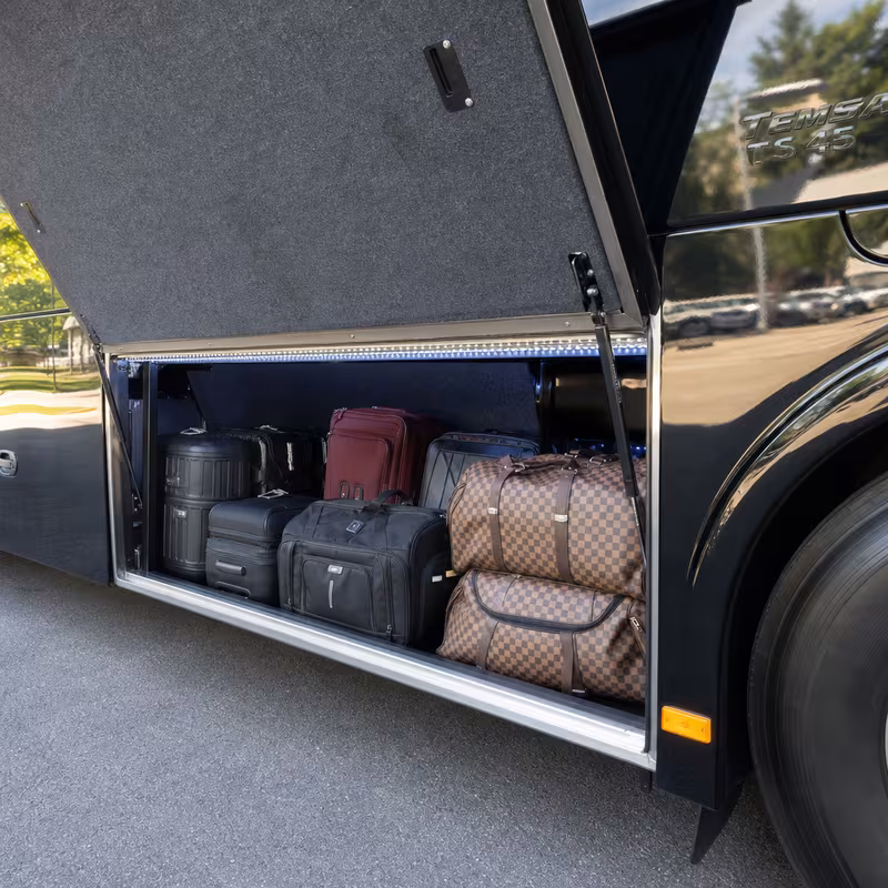 Party bus interior with wraparound leather seating and LED lighting in Washington